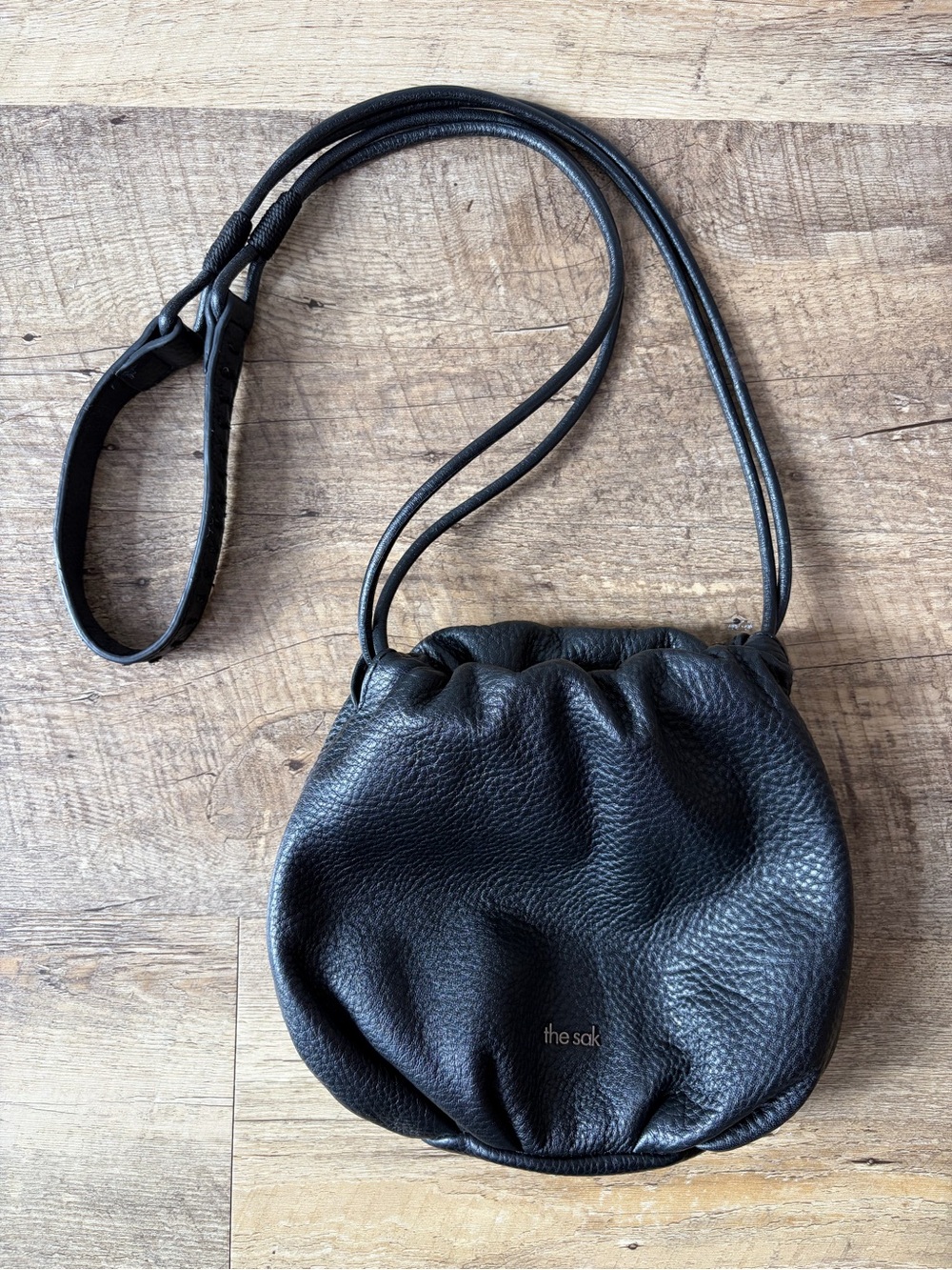 The Sak Lorelie Black Pebbled Leather Small Drawcord Crossbody Bag Purse